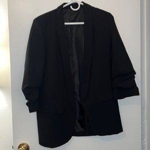 SOLD. Women’s black blazer with scrunched sleeves. Size large.